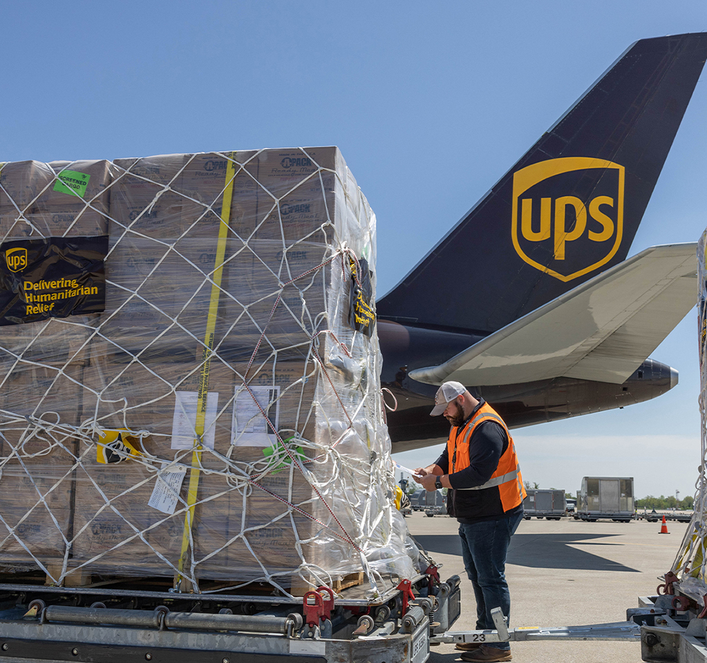 UPS cargo loading near airplane