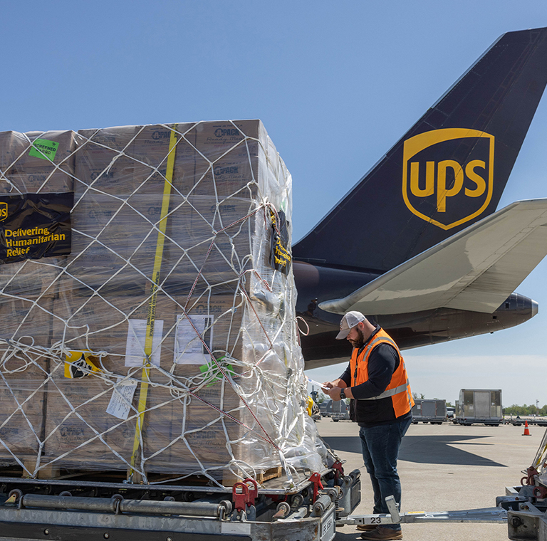 UPS cargo loading near airplane