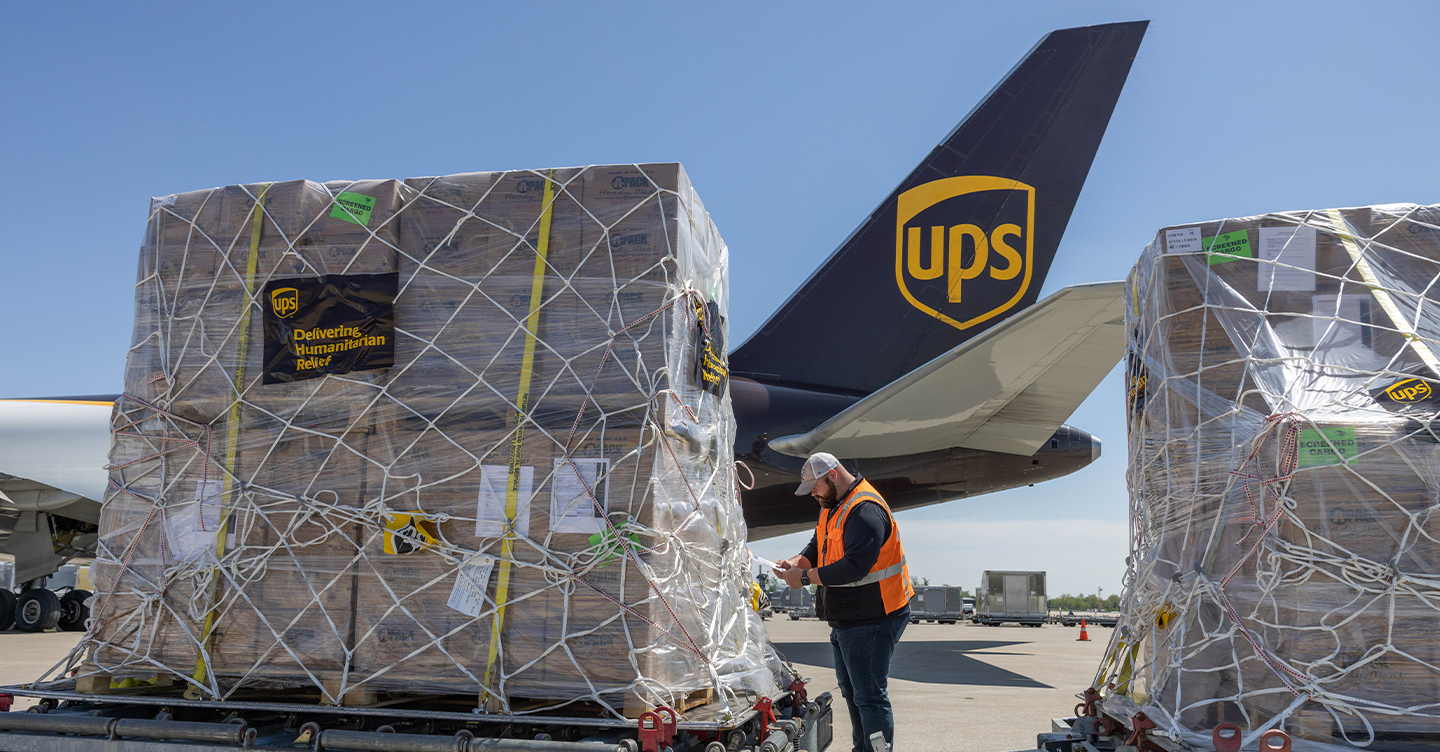UPS cargo loading near airplane