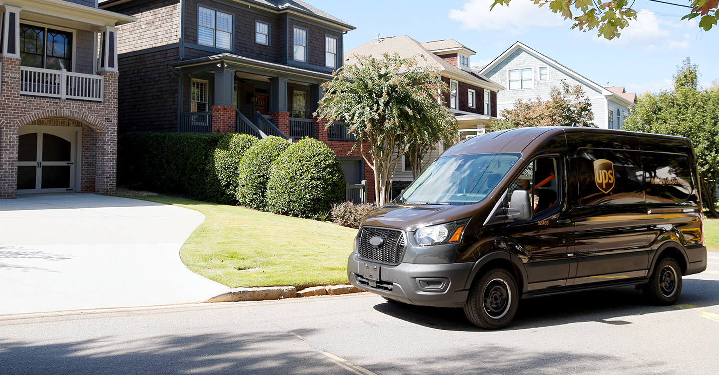 UPS delivery van parked in suburban neighborhood