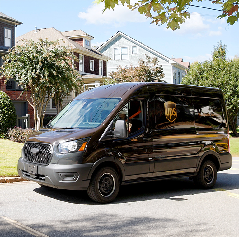 UPS delivery van parked in suburban neighborhood