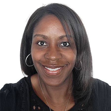 Woman smiling with large hoop earrings