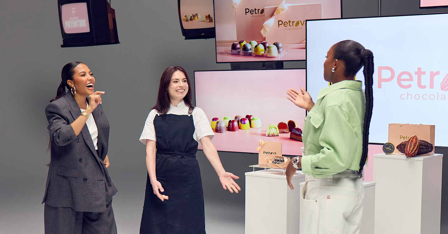 Group discussing colorful chocolate display