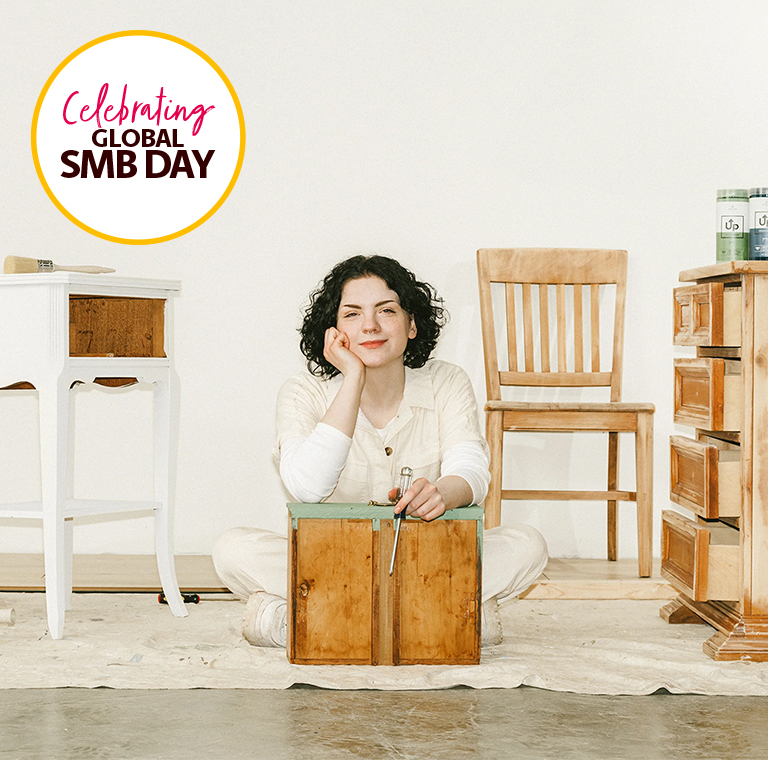 Woman Refinishing Wooden Furniture for SMB Day