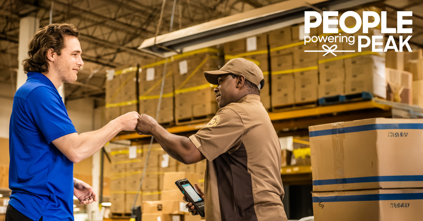 Warehouse handshake with delivery worker