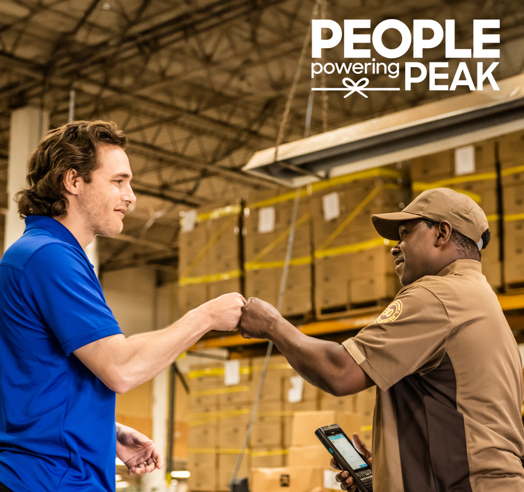 Warehouse handshake with delivery worker