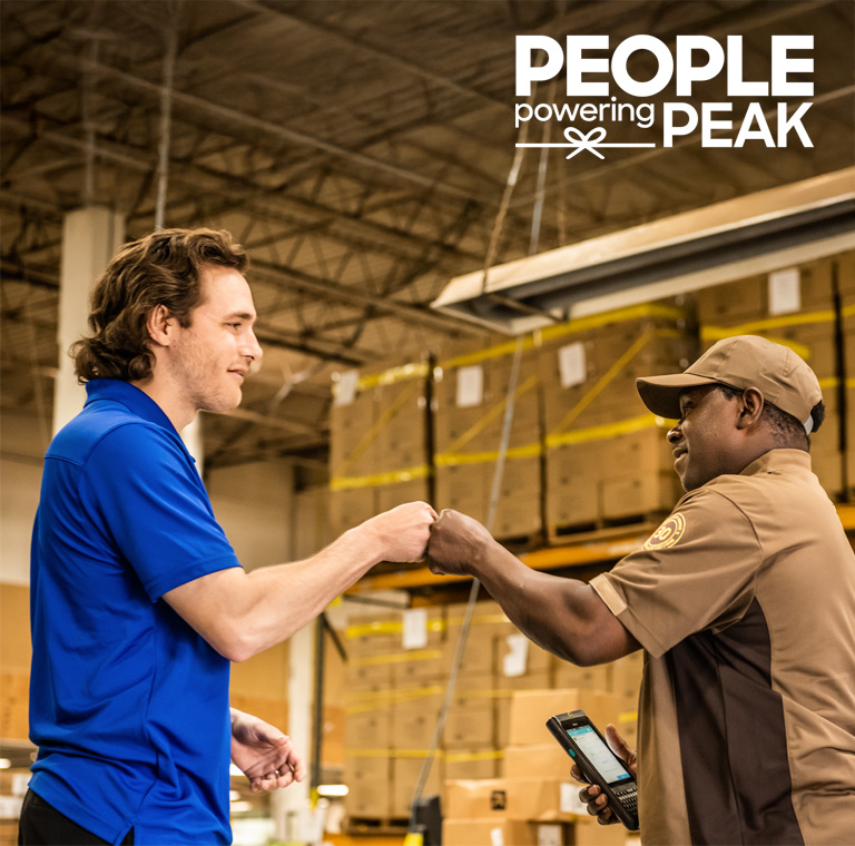 Warehouse handshake with delivery worker