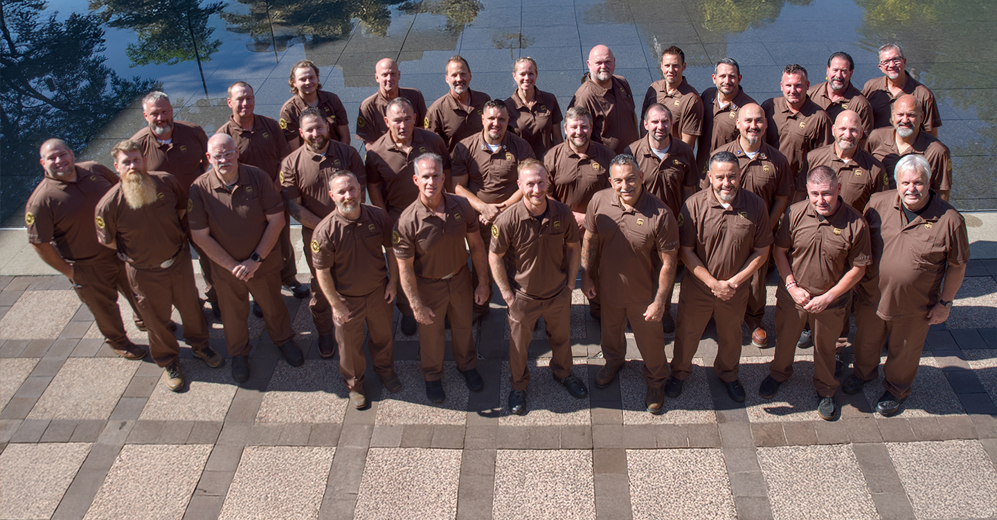 Group of uniformed UPSers outdoors