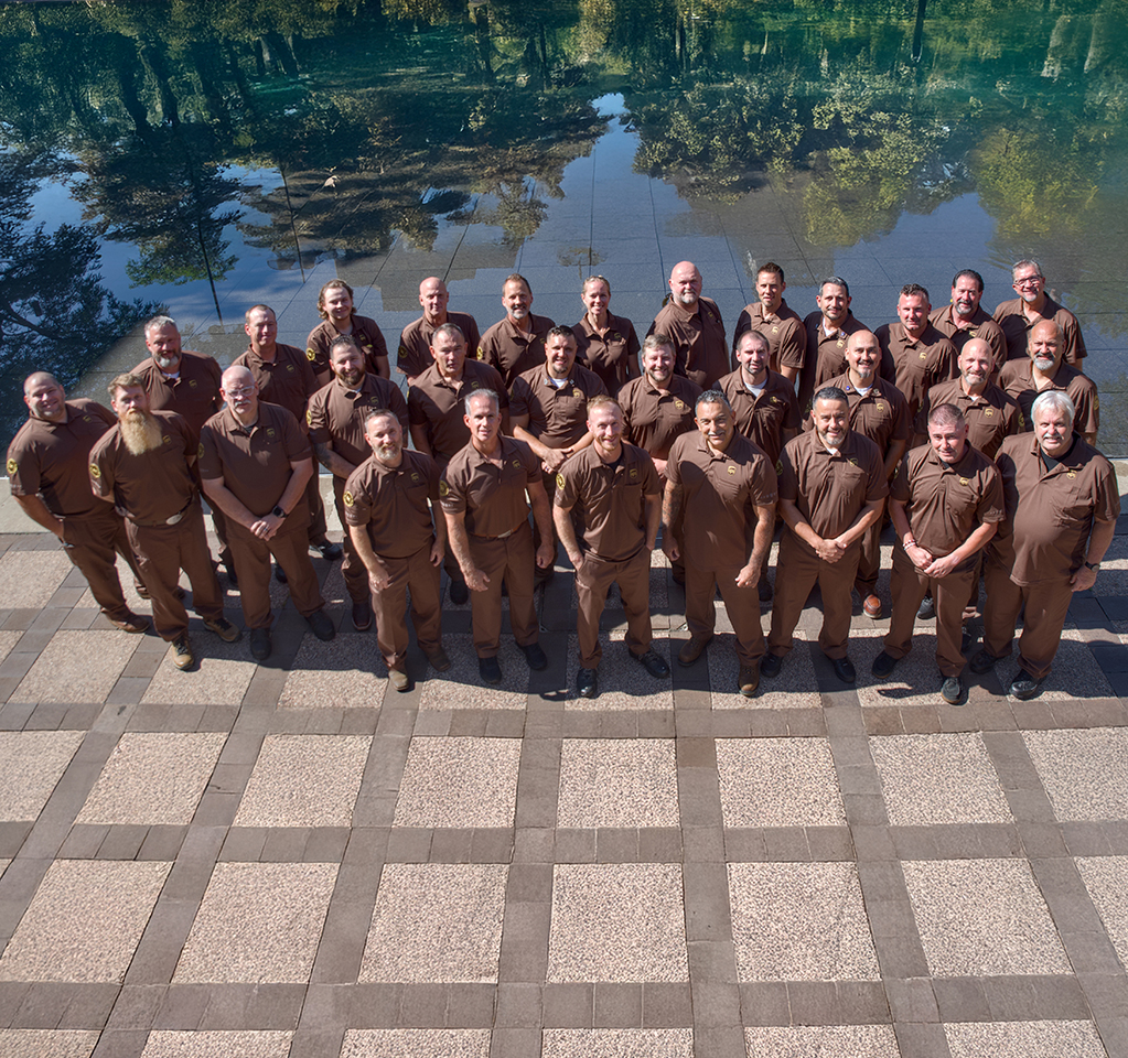 Group of uniformed UPSers outdoors