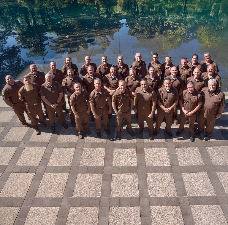 Group of uniformed UPSers outdoors
