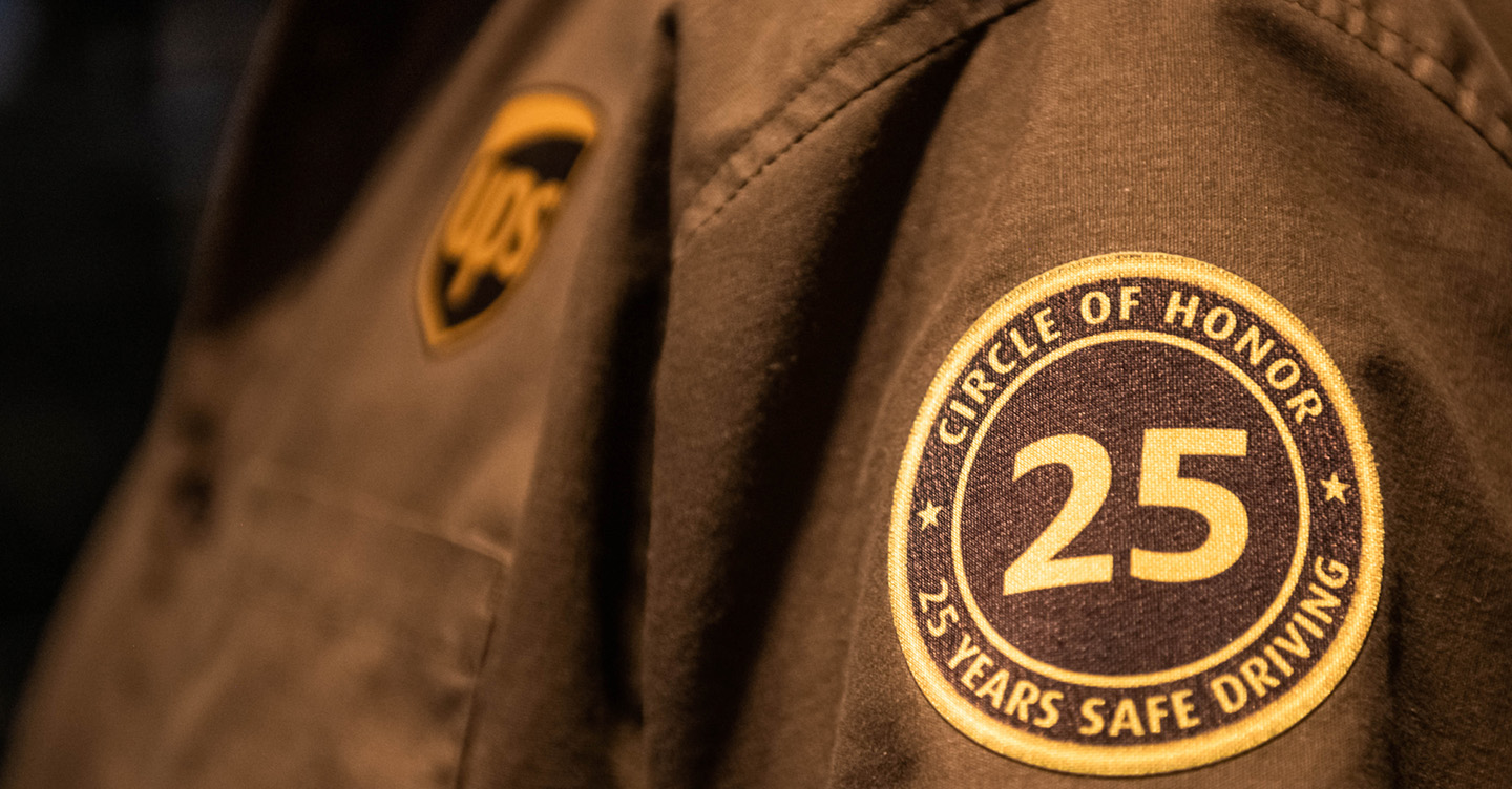 UPS uniform with 25 years honor patch