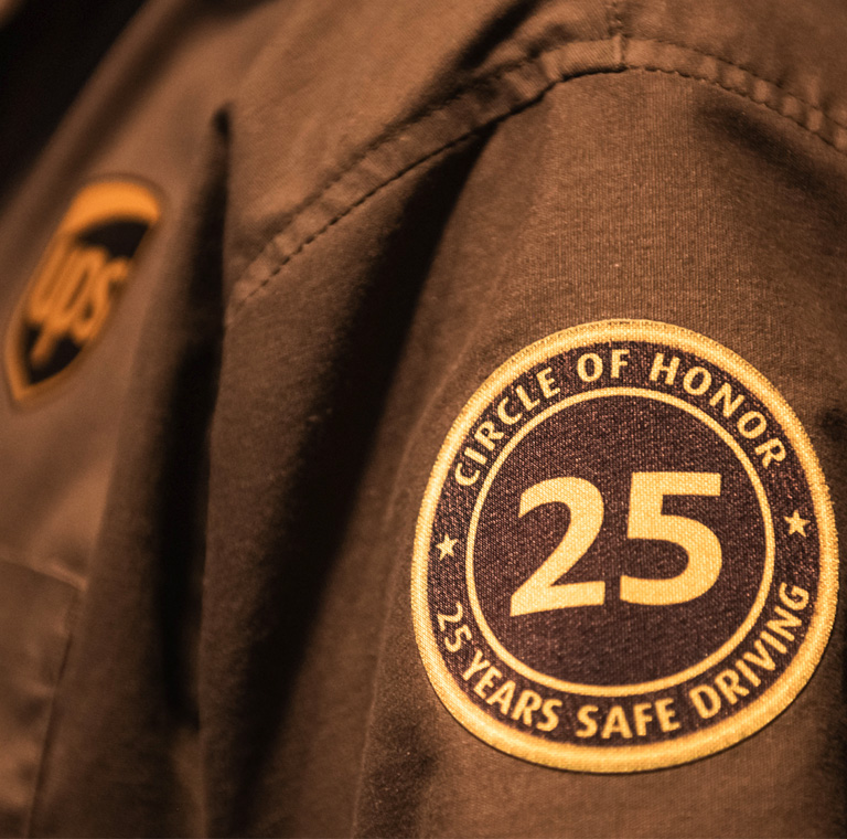 UPS uniform with 25 years honor patch